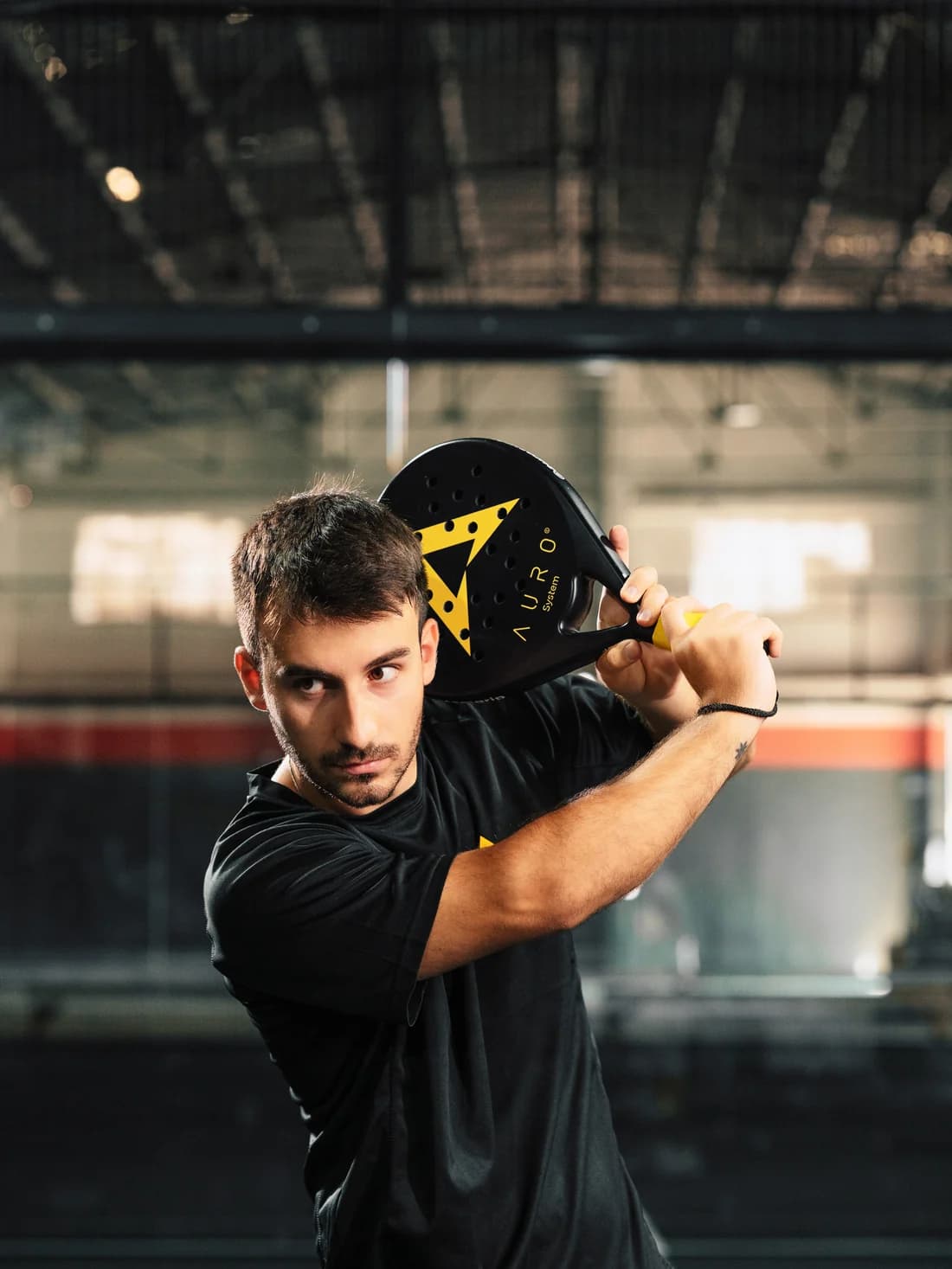 Player preparing the stroke with the Auro racket